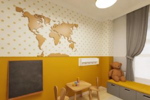 żółto szary pokój dziecięcy z motywem mapy świata ze sklejki